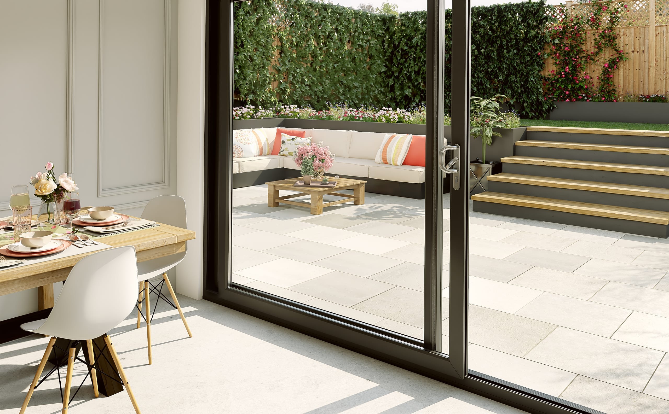 Anthracite sliding patio doors opening onto a patio dining area