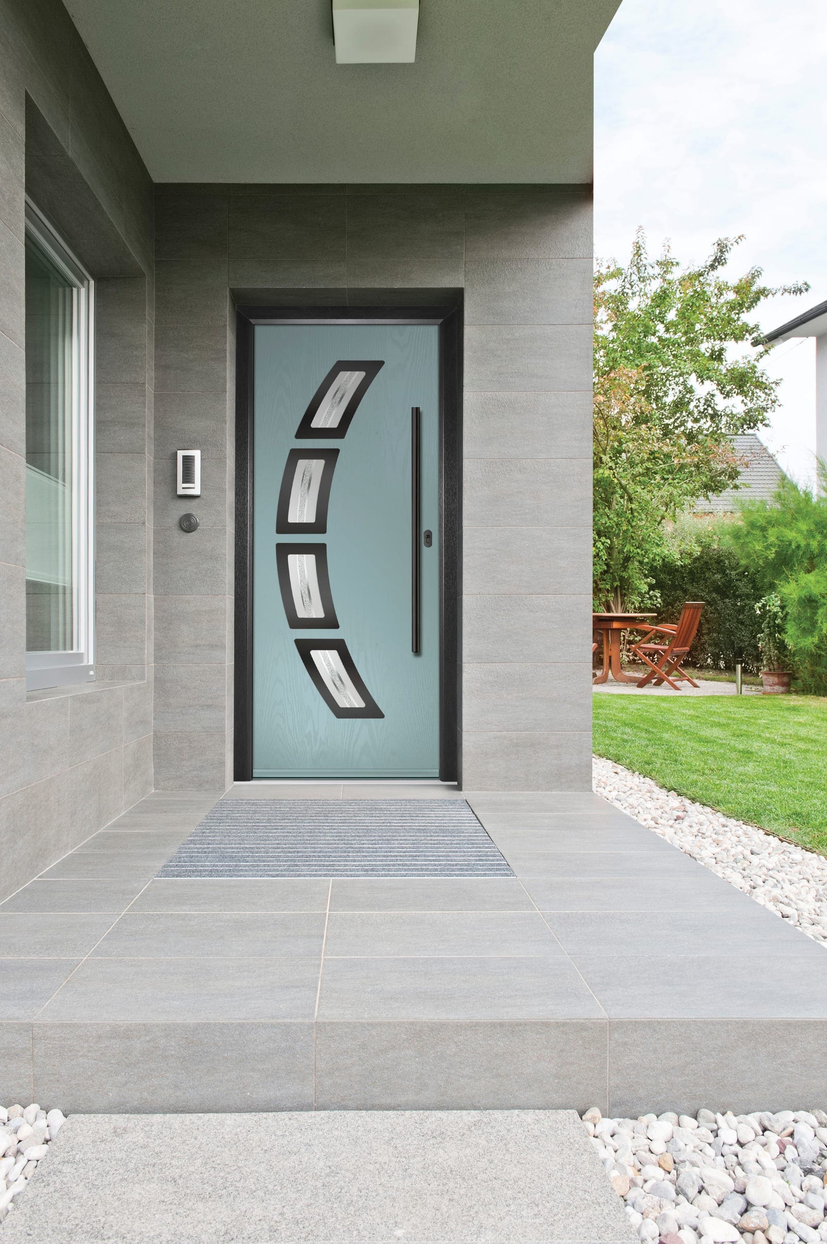 Contemporary front door with a curved glazed design