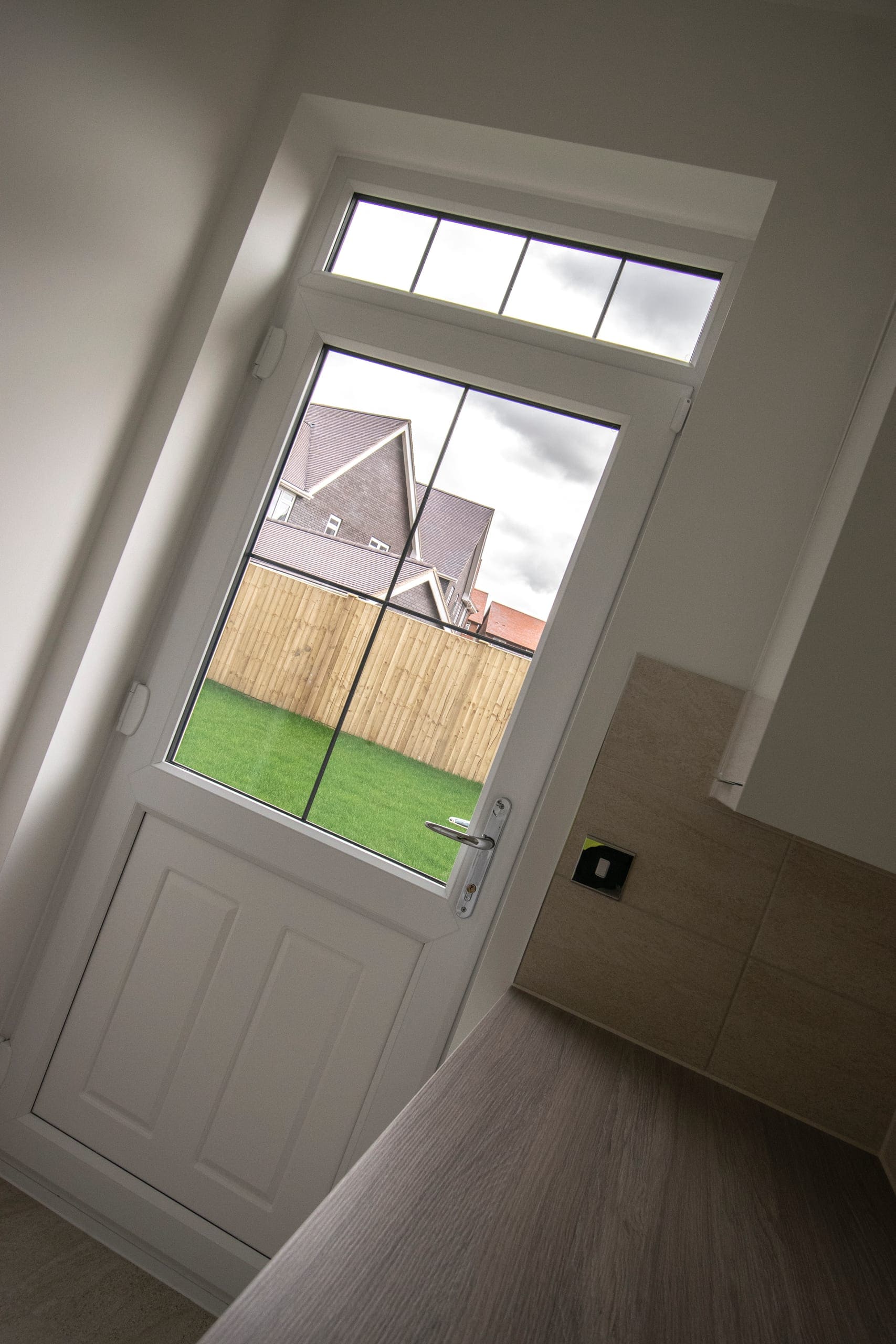 Contemporary glazed front door looking onto the garden