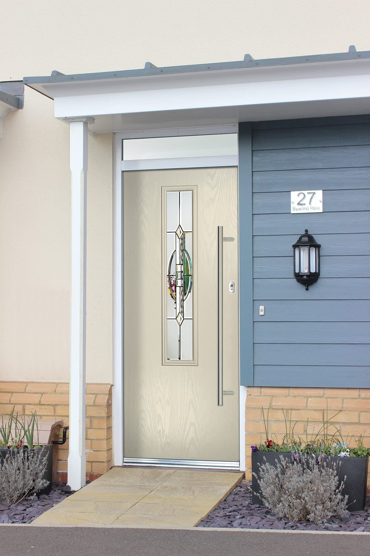 Contemporary front door with a stained-glass panel beside cladding