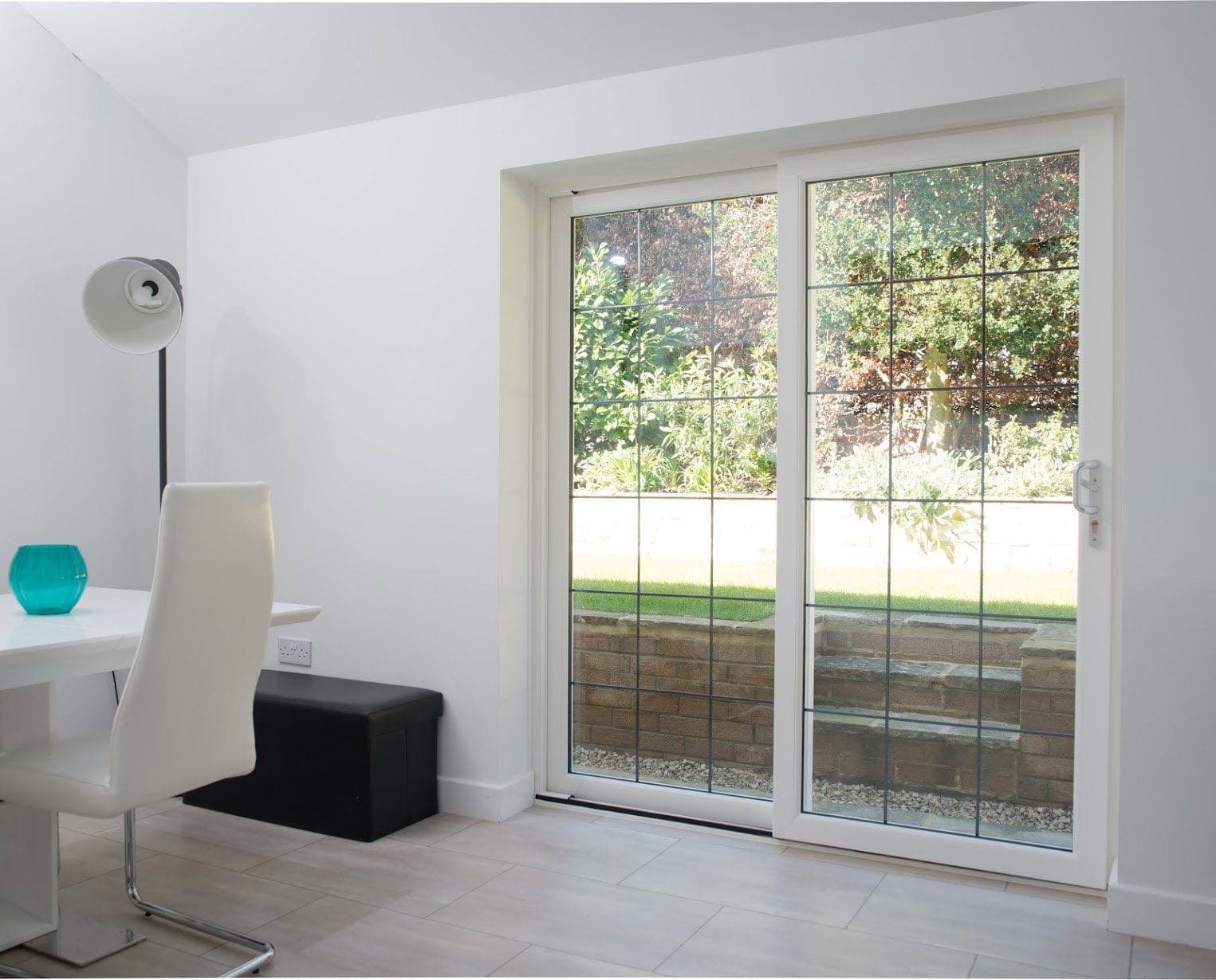 White sliding patio door in a home study